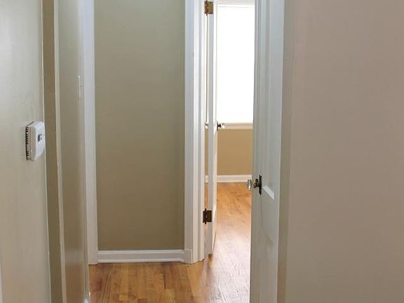 Hallway to bedrooms and bath. First door to the right is the linen closet.