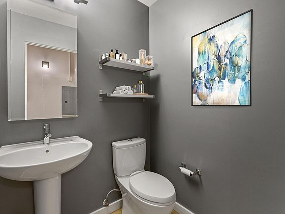 Convenient half bath located in the foyer