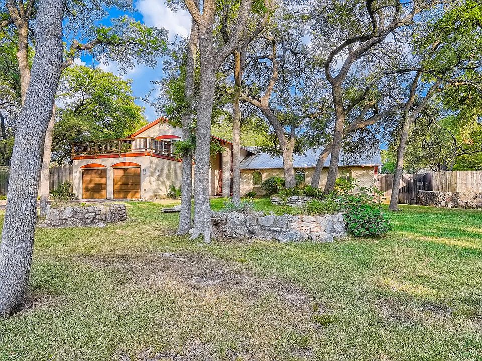 Part of the front yard and of the house