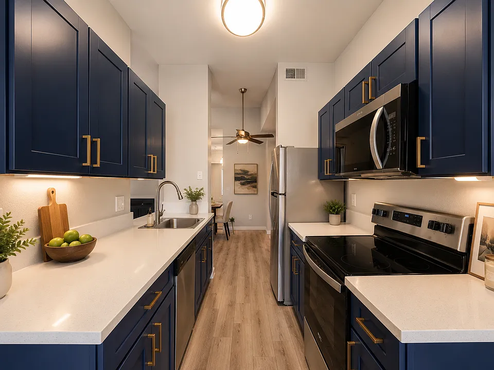 Modern galley kitchen with navy accents