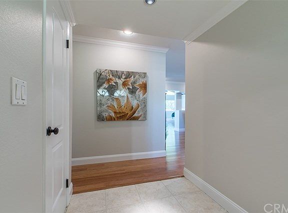 Entry just inside front double doors. Coat closet to the left.