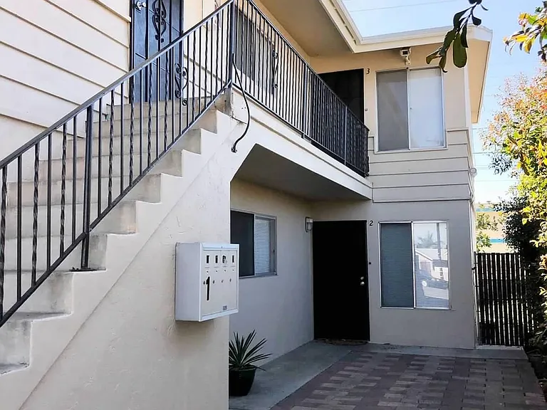 Top- floor unit in rear for rent!