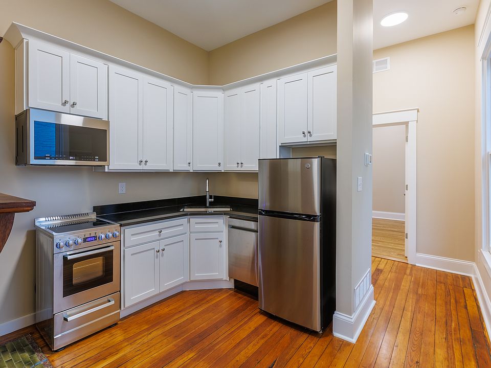 Brand new stainless steel appliances and custom cabinetry.