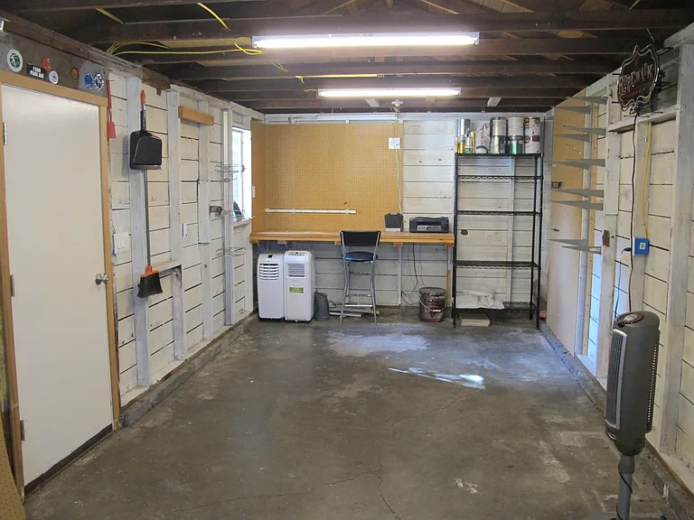 Garage with workbench.