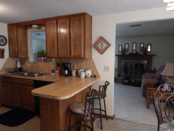 Kitchen bar open to living