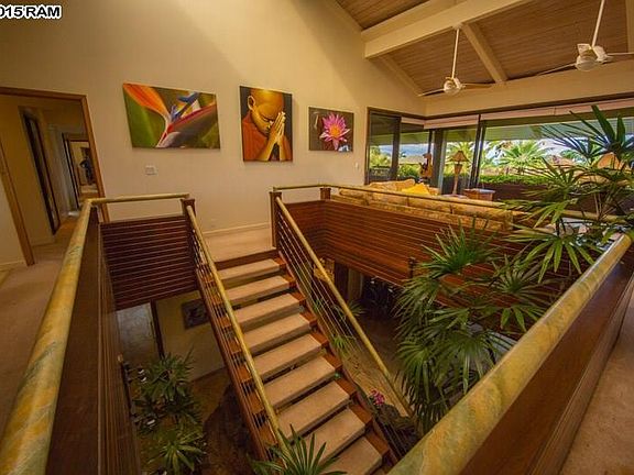Upstairs Living Area with High Ceiling and Upstairs Balcony Lounge Area and Outside Dining Area with Great Sunset View with the sound of the waterfall coming up from downstairs