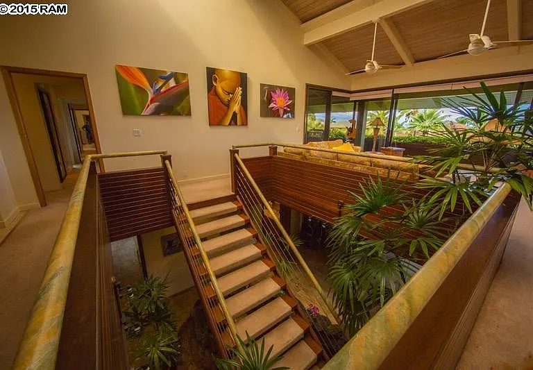 Upstairs Living Area with High Ceiling and Upstairs Balcony Lounge Area and Outside Dining Area with Great Sunset View with the sound of the waterfall coming up from downstairs