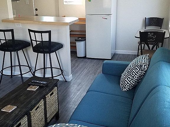 Roomy living area with double size convertible sleeper sofa.