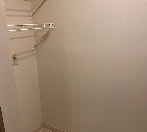 Fits a full size washer dryer past the kitchen