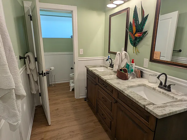 Master Bathroom with Toilet in Separate Room