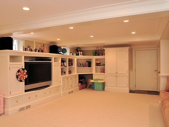 family room with built in cabinets