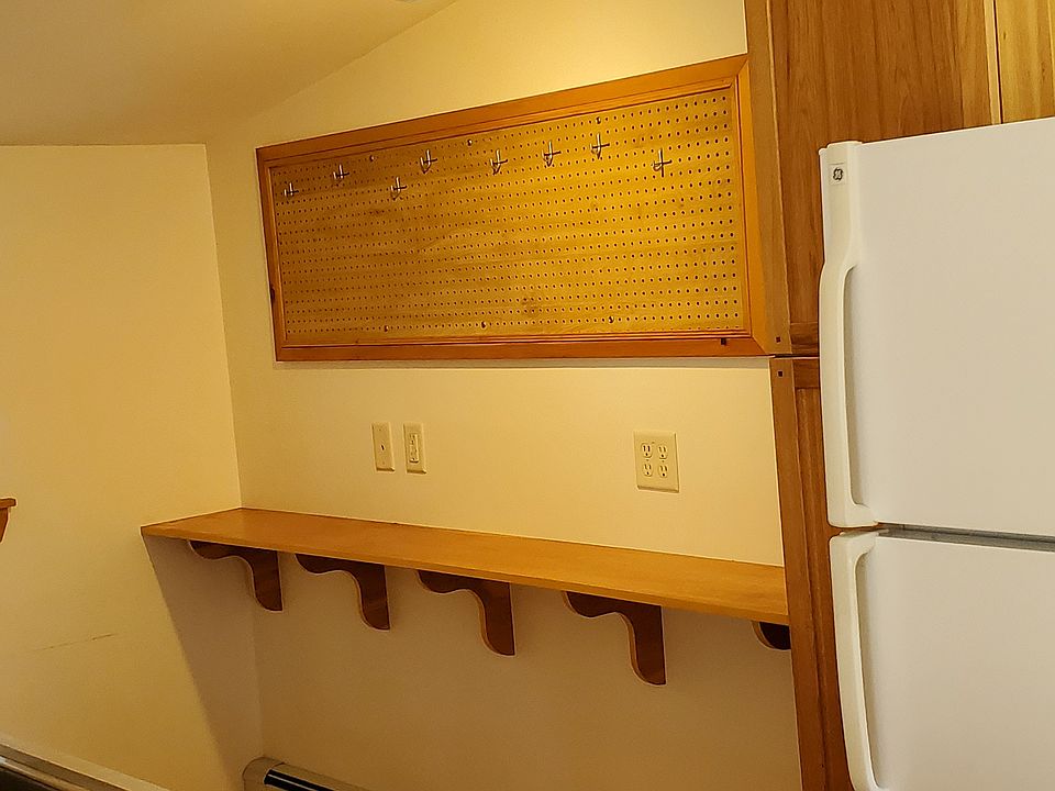 Peg board above counter for your pots and pans.