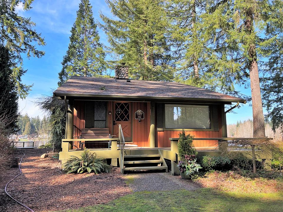 Front of cabin; lake in the back