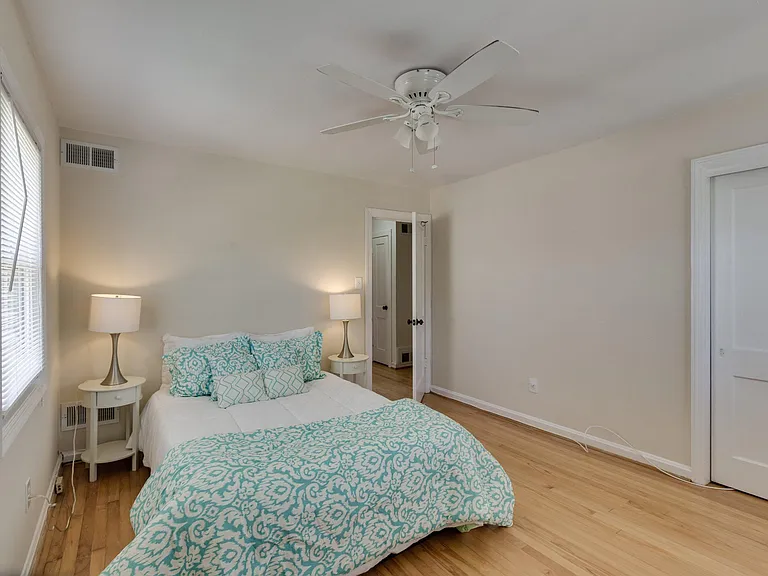Hardwood floors now stained a darker color