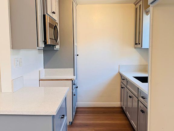 Kitchen. No Appliances included. Only over the range Microwave.