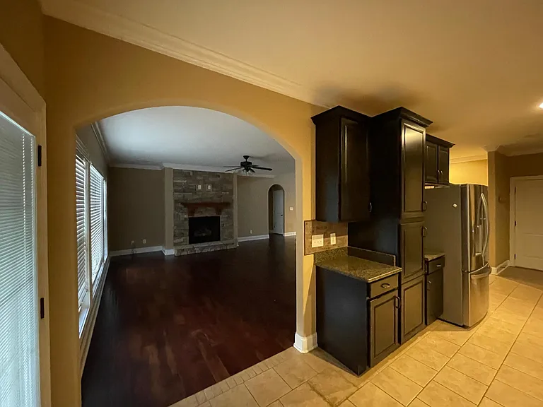 Kitchen looking into one of two living areas