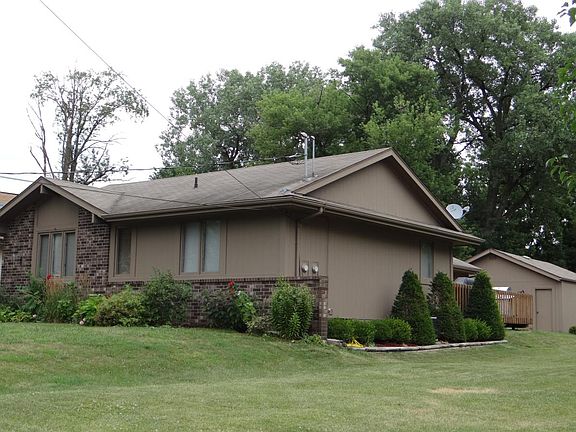 front of duplex, can see deck/garage