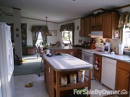 KITCHEN : CENTER ISLAND W/ELECTRIC OUTLETS