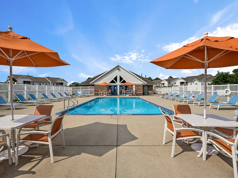 Relax poolside or gather with neighbors at our resort-style swimming pool and community seating areas, professionally operated by Highlands Vista Group.