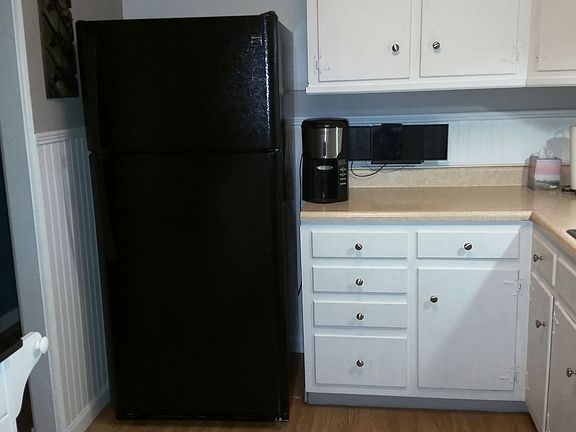 Kitchen has new fridge