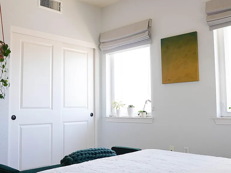 2nd floor primary bedroom with 2 closets (large closet pictured)