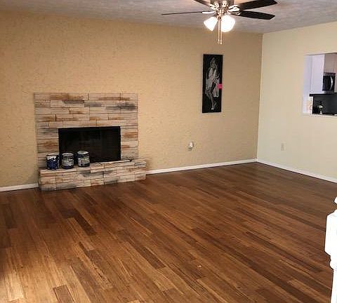 Living area wood burning fireplace with gas starter 