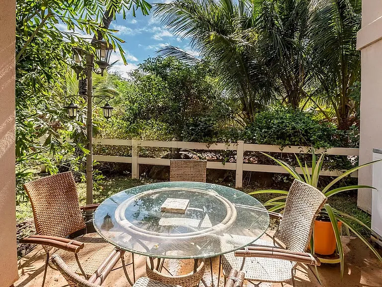 Quiet lanai with grass area, adjacent to pool area and gym Gulch view.