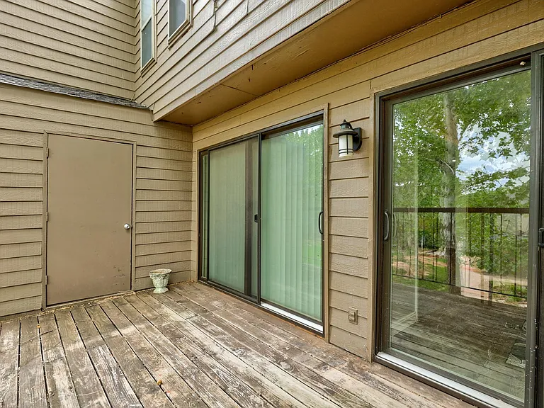 Balcony patio with storage room.