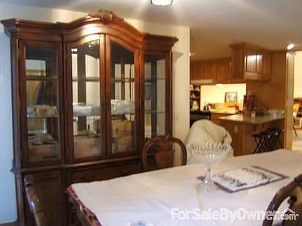 Upper floor living room, open floor plan
						:
						FP wood box, built-in dining hutch and buffet,, bfkt.counter, pass-through kitch