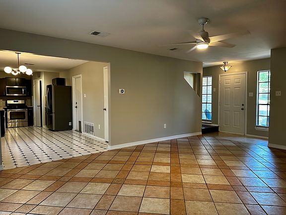 Living room view into dining room