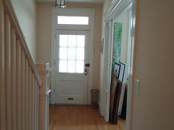 Foyer Entry-Hardwood floors throughout the house's Main Level and Upstairs.