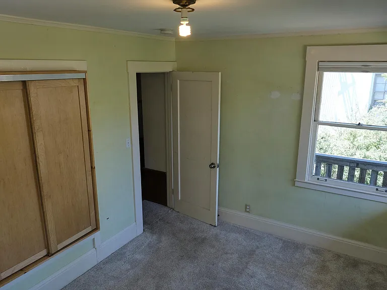 Interior detail of bedroom and closets. The carpet is very plush and like new.