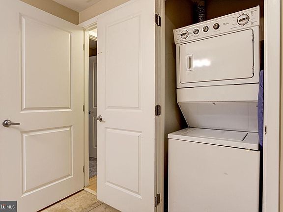 In-unit washer and dryer. It's in the secondary bathroom.
