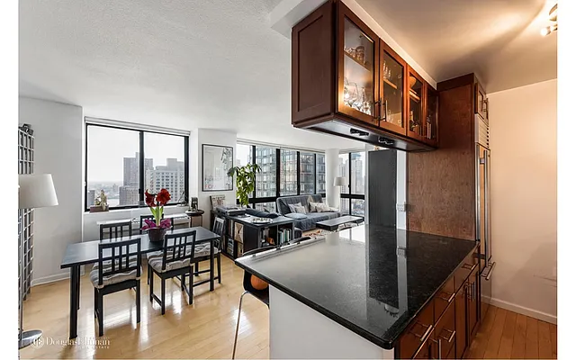 Sold by Douglas Elliman | media 18