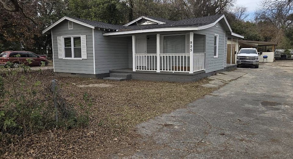 A cozy, well-maintained home featuring a welcoming front porch, private driveway, and spacious yardperfect for comfortable everyday living.