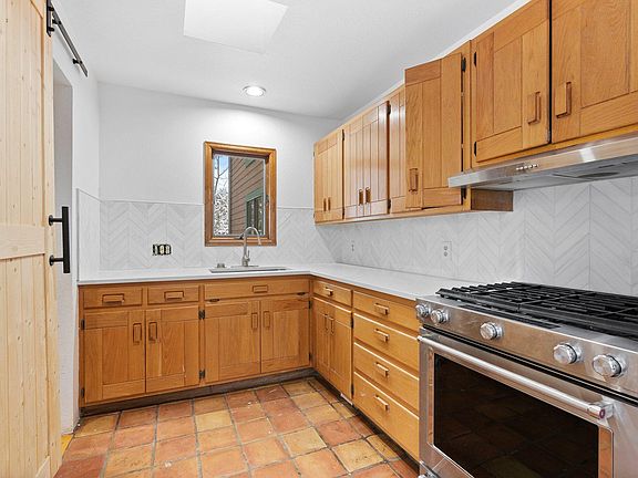 Gas range and single door refrigerator