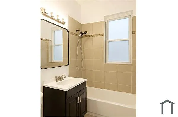 Building Photo - 7127 S Eberhart Ave #2