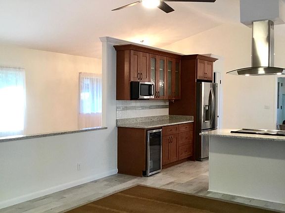 Refrigerator, microwave and beverage cooler.