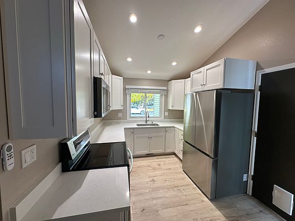 Completely NEW Kitchen. Over 13" of counter space. Microwave over oven, freeing up counter space. "Counter Depth" 26.5 French Door Fridge w/ Filtered water and Icemaker.