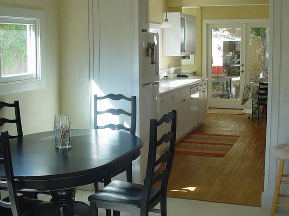 Dining area leads to galley kitchen