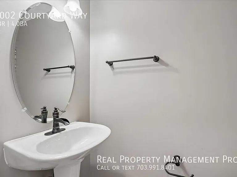 7002 Courtyard Way — Photo 18