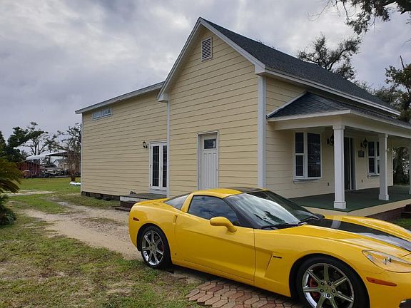 Side entrance, garage to come. . .