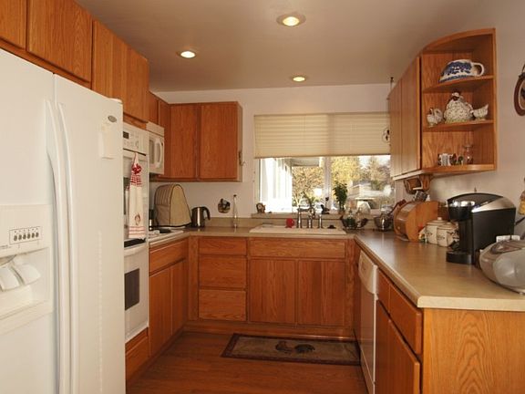 Updated kitchen with newer cabinets, countertops and flooring. All appliances to stay with the home.