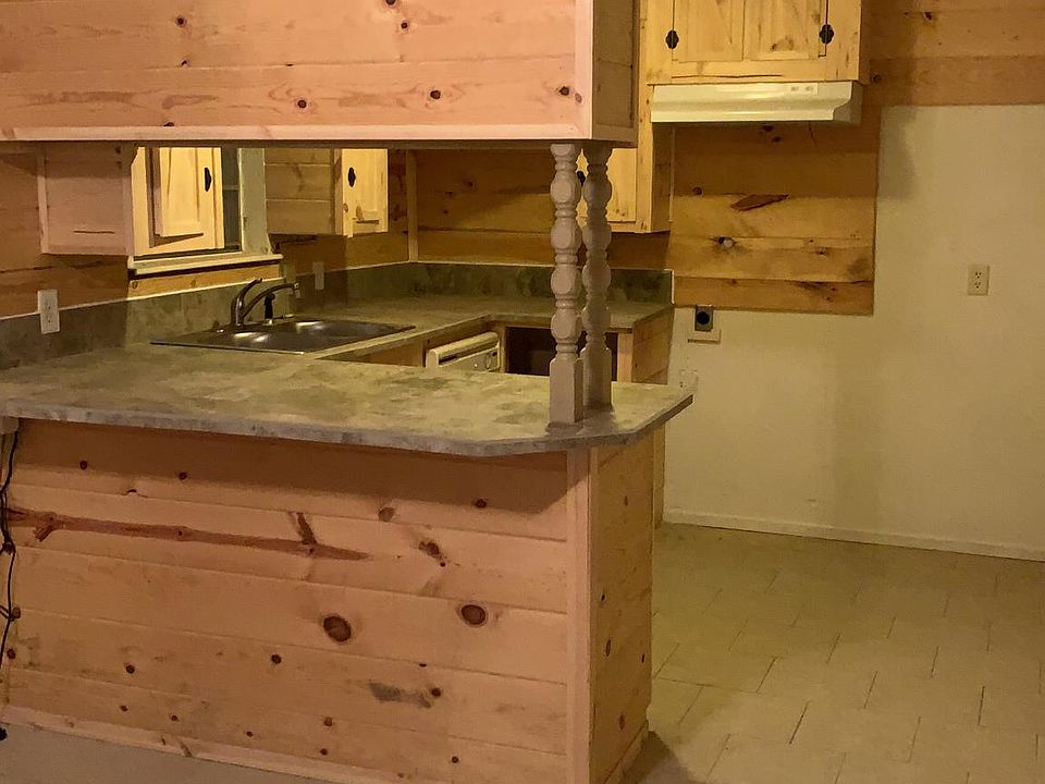 Refaced Pine Cabinets with Tile countertops.