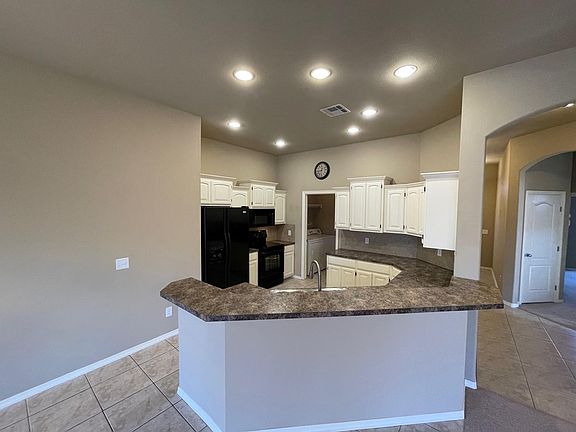 Open concept kitchen/living/dining