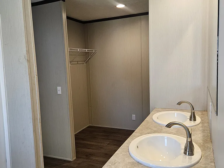 Spacious closet in primary bathroom