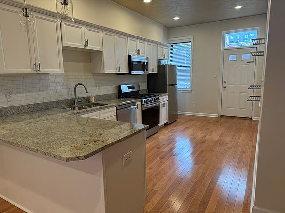 New kitchen, custom cabinetry and quartz countertop (approx picture), to be installed in July.