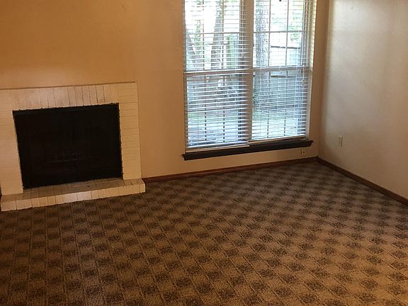 Living room with fireplace.