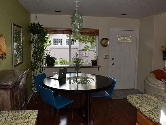 Kitchen dining area overlooking patio