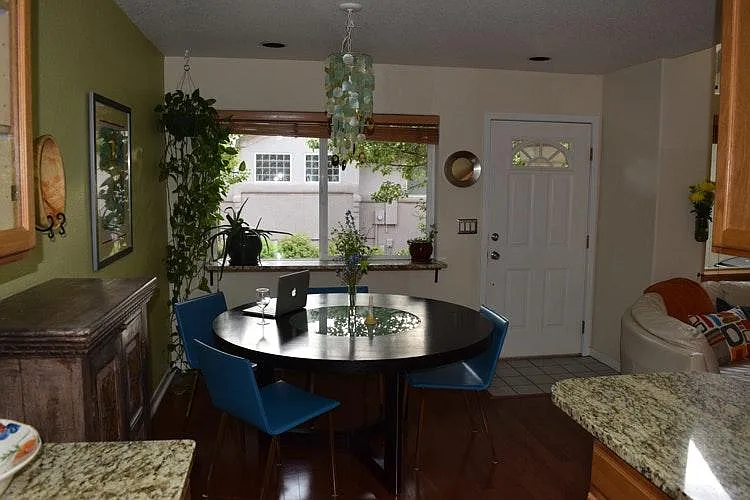 Kitchen dining area overlooking patio